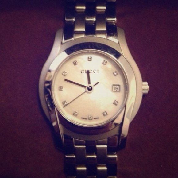 Gucci watch with diamonds like new